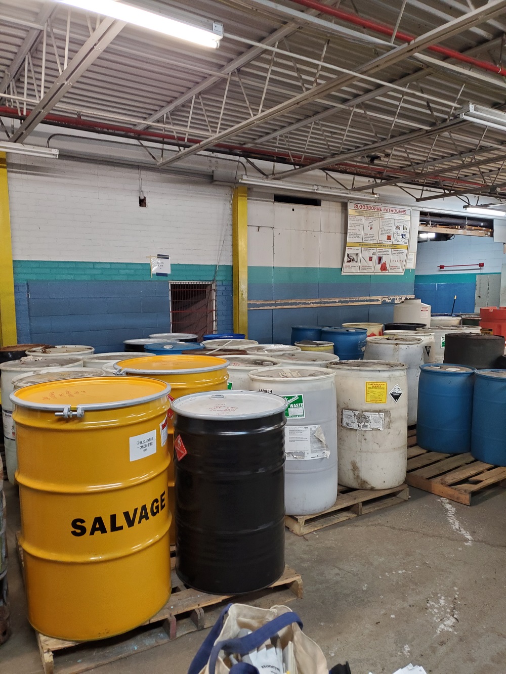 Industrial waste in storage drums